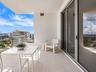 Staged balcony overlooking the city