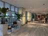 Floor-to-ceiling dark wood-finish paneling with integrated wall shelving, white lacquer built-in cabinetry, polished stone flooring, and a sleek break