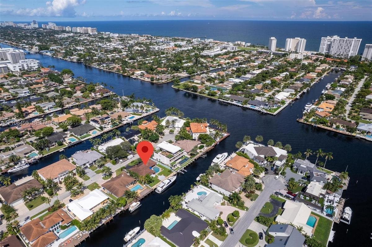 Waterfront property featuring deep-water canal frontage, private boat dockage, and a swimming pool