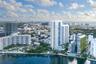 Aerial perspective featuring a metropolitan skyline, deep water bay, and waterfront island landscape