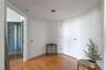 Entryway featuring wood-finish flooring, two interior doors, and recessed ceiling lighting