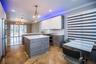 Kitchen has built in appliances and island
