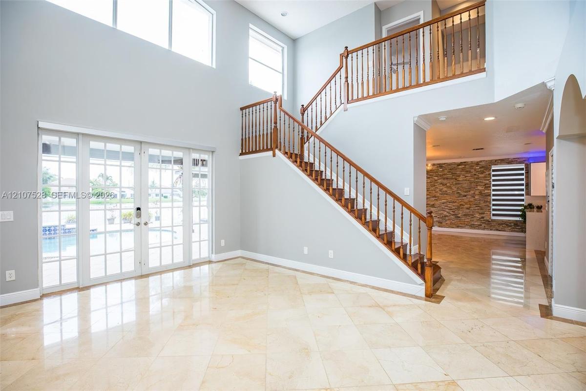 Living Room has patio access and amazing light!