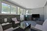 sun room with door to back property