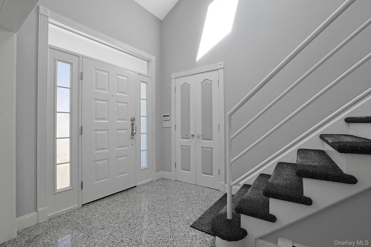 Sun-filled gracious double-height entry