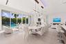 Virtually Staged. Dinning area with sitting area overlooking your heated salt water pool