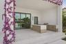 Outdoor cabinetry with Neolith Countertops and waterfall gas grill, fridge