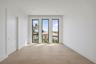 Upstairs front bedroom with bathtub custom linen closet and walk in closet not built out - 2nd floor