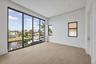 Upstairs rear bedroom with canal views, balcony access and onsuite bathroom with 2 vanities, shower and smart toilet