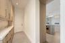 pantry floor to ceiling cabinetry , marble counter & backsplash and instahot faucet. ac closet at end of room