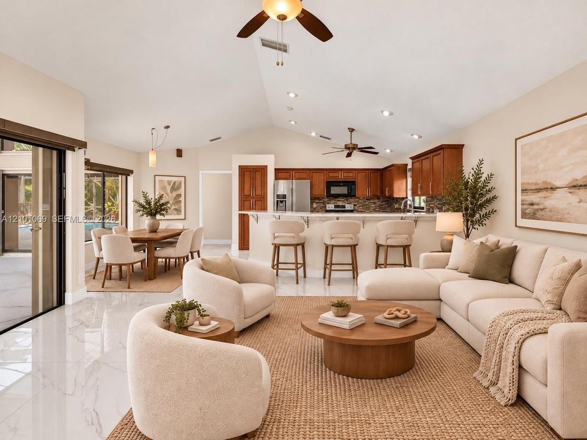 Vaulted ceilings, new LED recessed lighting, granite counter top, expansive, built-in cabinetry, -virtually staged