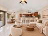 Vaulted ceilings, new LED recessed lighting, granite counter top, expansive, built-in cabinetry, -virtually staged
