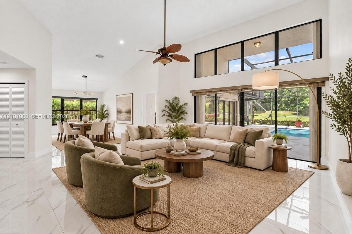 Large porcelain flooring throughout, open, airy with natural light. Separate dining room- virtually staged