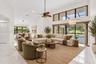 Large porcelain flooring throughout, open, airy with natural light. Separate dining room- virtually staged