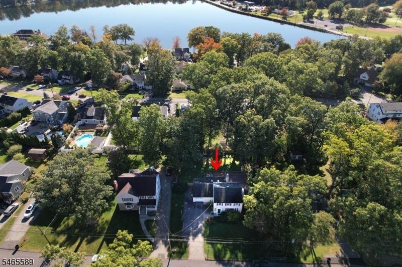 aerial view of home and lake
