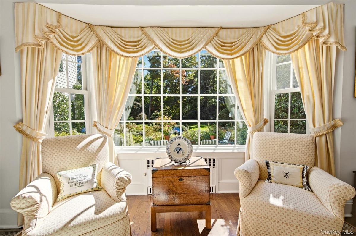 Light filled living room with bay window