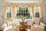Light filled living room with bay window