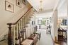 Light filled front entrance foyer with dutch door.