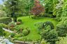 English gardens frame the walkways and bluestone terrace