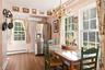 Eat-in kitchen leads to laundry room