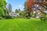 Two park-like acres of lawns