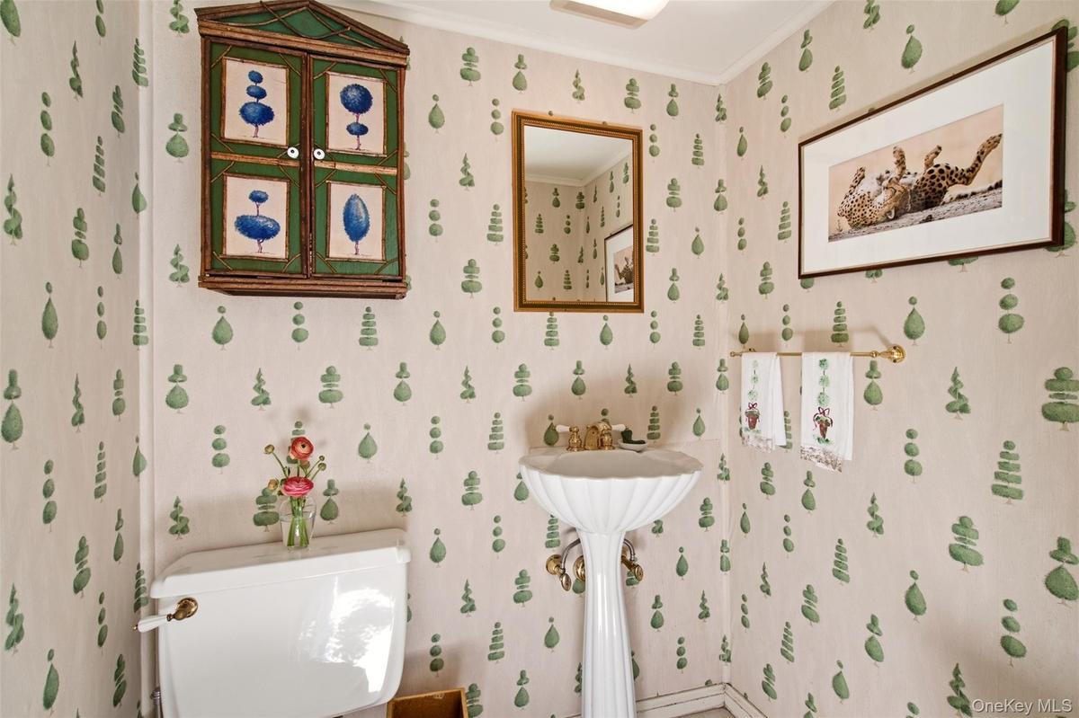 Powder room located off of front entry