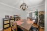 Dedicated dining space positioned conveniently near the living area