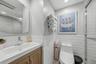 Chic, spa-like bathroom showcasing contemporary finishes, clean lines, and a bright, serene atmosphere.