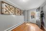 Alternate angle of the welcoming foyer and hallway area showing seamless flow into the home.