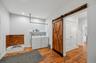 Use this entrance from the garage if you have been working in the barns! Note the "doggie" bath