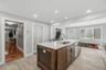 Expertly designed kitchen equipped with premium appliances, sleek countertops, and plenty of storage for all your culinary needs.