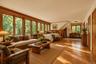 Bright Oversized Family Room W/ Wall Of Windows Digitally Enhanced