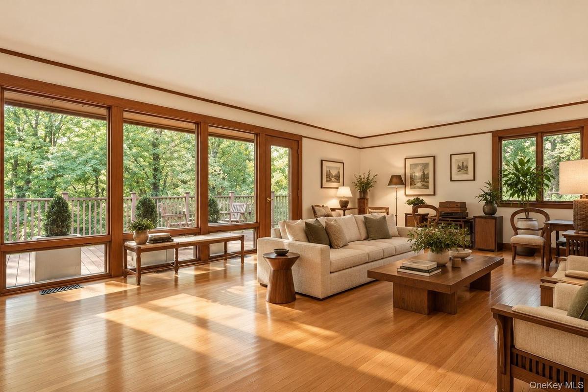 Wall Of Windows In This Digitally Enhanced Living Room