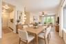 Open-concept living space featuring wood-finish flooring, recessed lighting, a modern multi-globe pendant light fixture, a ceiling fan with integrated