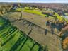 Aerial View – Farm Fields and Barns