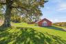 Secondary Barn Featuring 31 stalls, 3 Farm Staff Apartments & Lounge