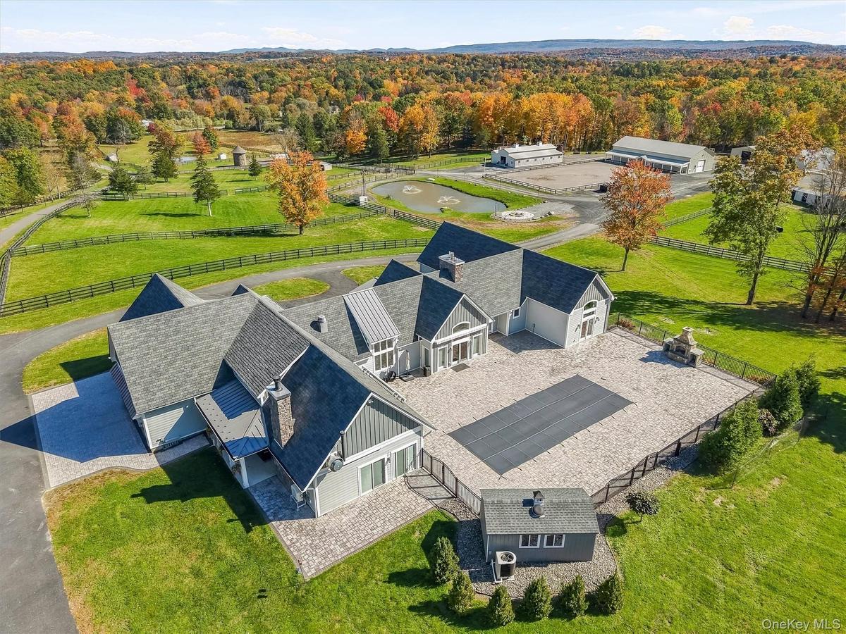 Aerial view of of this absolutely gorgeous equestrian estate on sprawling 36 acres