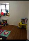 Game room with baseboards and dark wood-style floors