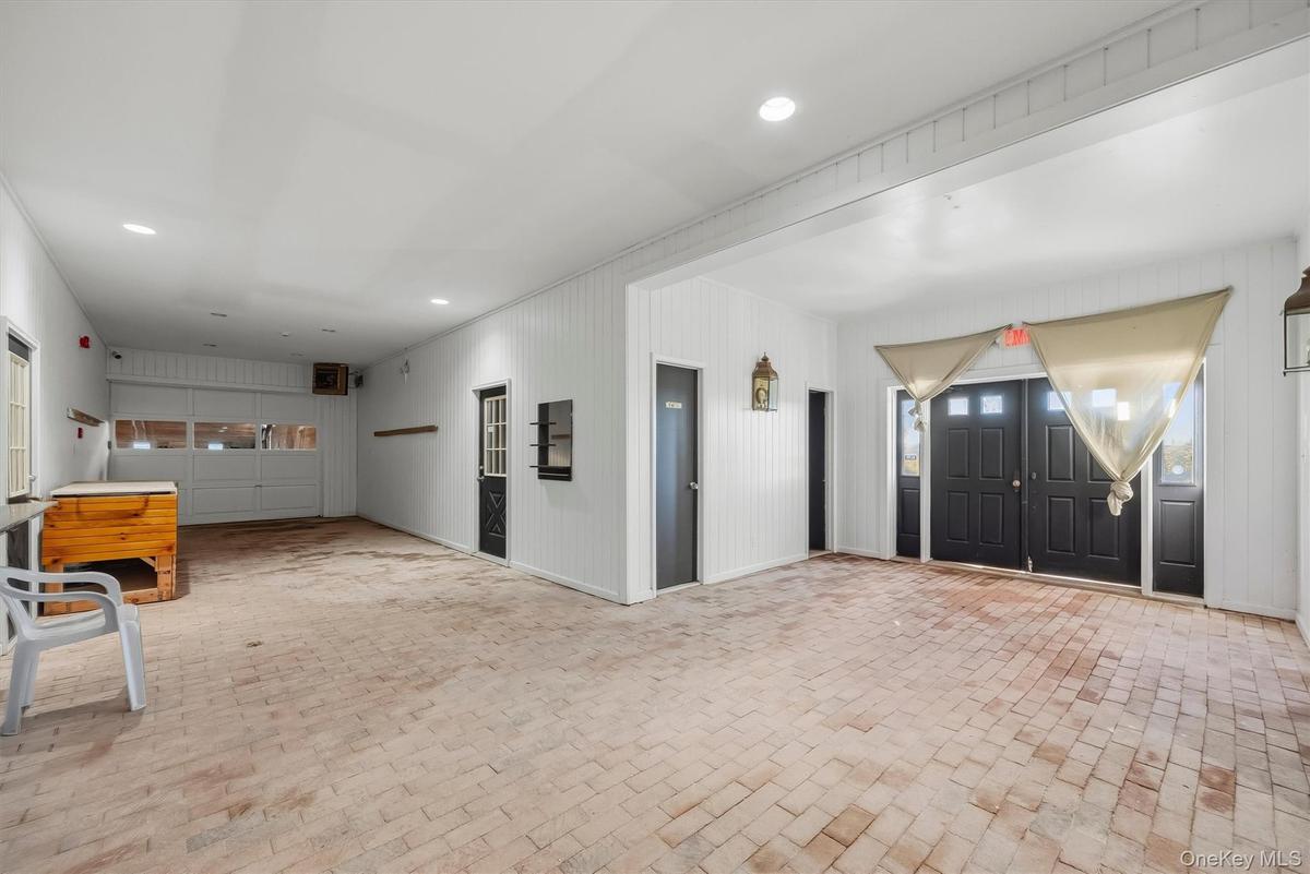 Main Barn Entrance with Direct Access to Indoor Riding Arena - Farm Office #2 and Two Half Baths