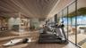 Fitness facility featuring wood-slat ceiling, full-height glass walls, wood-finish flooring, and built-in shelving