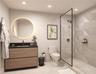 Modern vanity with wood-finish cabinetry, dark stone-style countertop, circular backlit mirror, and walk-in shower featuring glass enclosure, matte bl