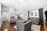 Vaulted ceiling, wood-finish flooring, recessed lighting, and white wooden stair railing