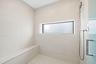 Primary bath shower bench + shampoo niche