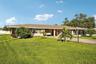 Duplex - 309 on left, 311 on right - oversized lot, covered parking for two cars, private screened lanai for each