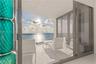 Covered balcony featuring large-format tile flooring, frameless glass railing, and floor-to-ceiling sliding glass doors