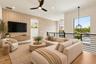 Virtually Staged, outside of primary bedroom upstairs can be used as a second seating area.