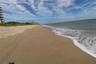 Sandy beachfront coastline featuring natural dunes and ocean access