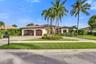 Circular driveway fits 9+ cars, & surrounded with lush landscaping
