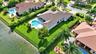 Fully fenced yard with privacy hedges
