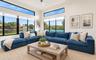 HUGE family room with tons of (IMPACT) windows and natural light
